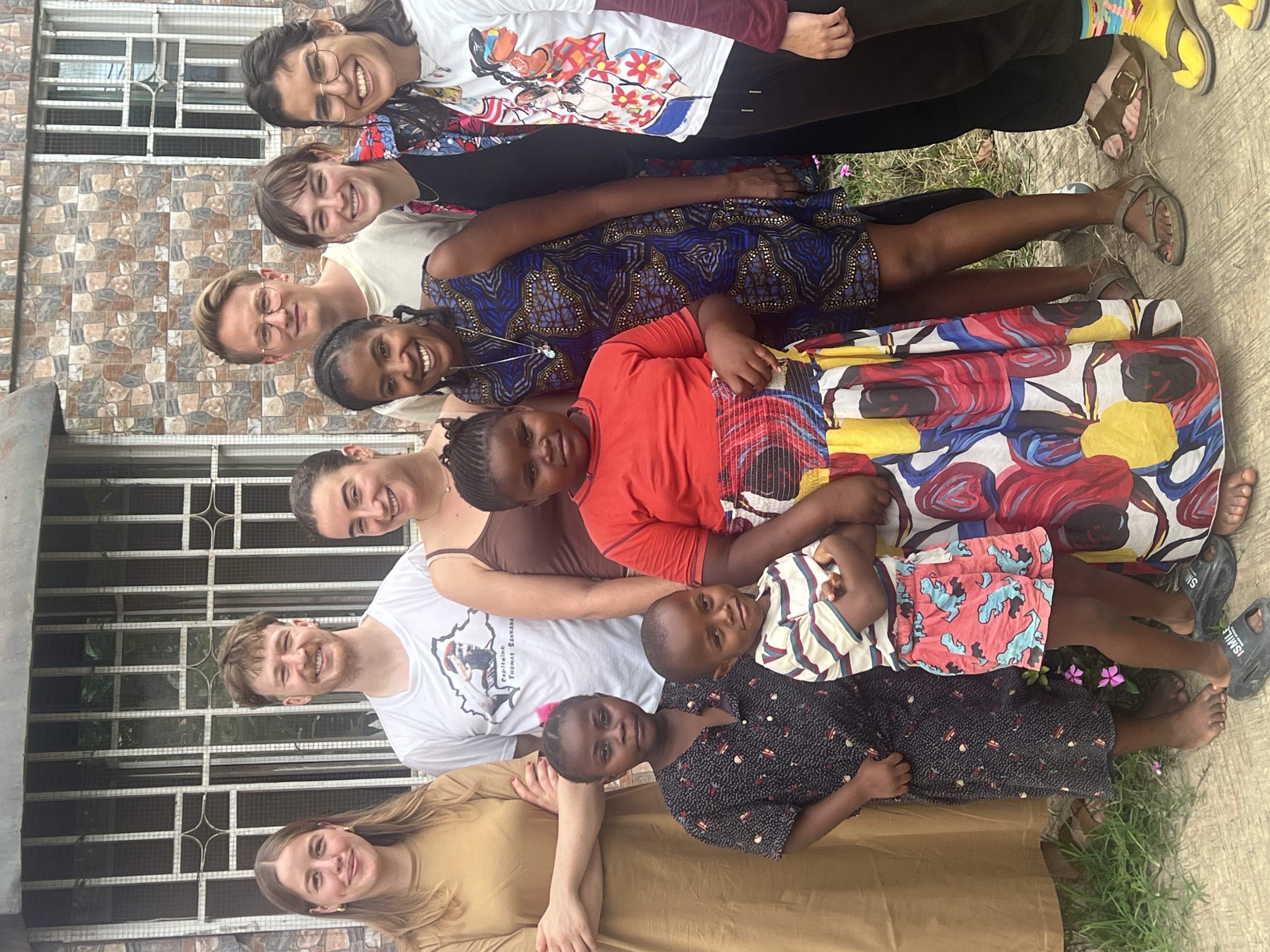The ODEKA and research team with children from the community